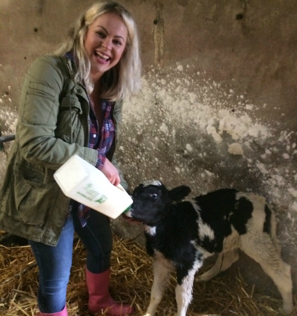 Amanda Brunker learning how to feed calves